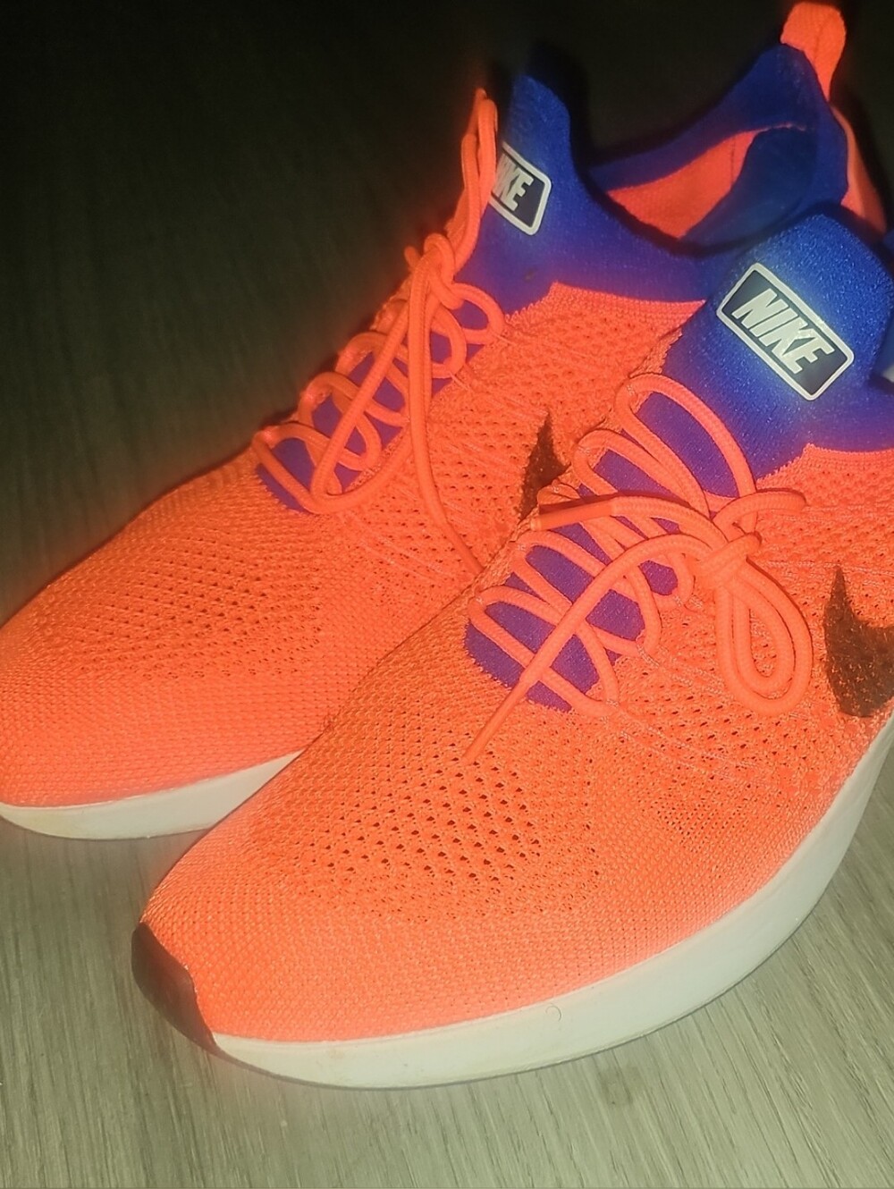 Nike Orange Knit Athletic Shoes with Blue Collar and Black Swoosh